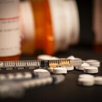 Illustrative. Opioids in a loaded syringe and pills. (iStock)