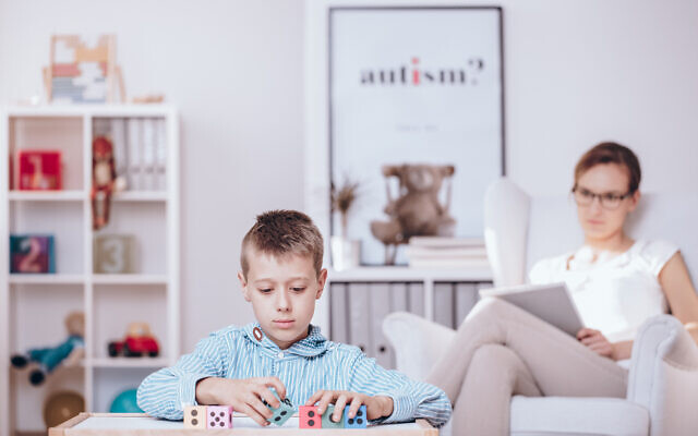 Illustrative image: a child with autism mastering the skill of straying up blocks. Adaptable skills can prove challenging for some people with autism. (KatarzynaBialasiewicz via iStock by Getty Images)