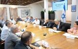 Prime Minister Yair Lapid in a fire preparedness review meeting at the Kirya military base in Tel Aviv, August 10, 2022. (Amos Ben Gershom/Government Press Office)