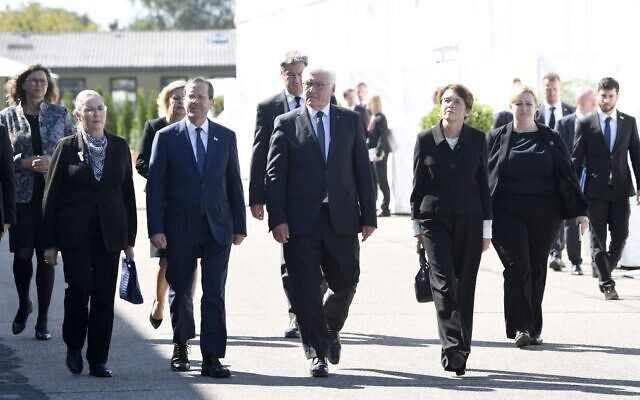 First Lady Michal Herzog, President Isaac Herzog, German President Frank-Walter Steinmeier and Germany's First Lady Elke Buedenbender arrive for a ceremony to mark the 50th anniversary of an attack on the 1972 Munich Olympics, at the Fuerstenfeldbruck Air Base, southern Germany, on September 5, 2022. (Thomas KIENZLE / AFP)