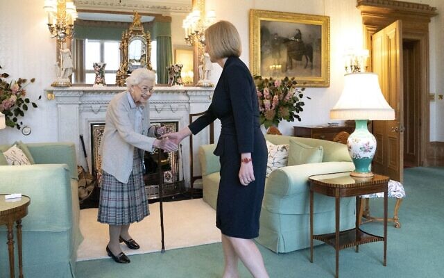 In this file photo taken on September 6, 2022 Britain's Queen Elizabeth II and new Conservative Party leader and Britain's Prime Minister-elect Liz Truss meet at Balmoral Castle in Ballater, Scotland. (Jane Barlow / POOL / AFP)