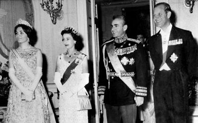 In this file photo taken on March 2, 1961, Britain's Queen Elizabeth II (2nd L) and Prince Philip (R) pose with Iran's Shah Mohammad Reza Pahlavi (2nd R) and his wife Farah Pahlavi during their state visit to Tehran. (Central Press/AFP)
