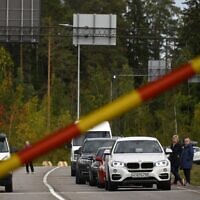Traffic from Russia lines up trying to enter Finland at the Finnish/Russian boarder crossing at Vaalimaa, Finland on September 22, 2022, a day after President Vladimir Putin announced a military mobilization amid the Russian invasion of Ukraine. (Olivier Morin/AFP)