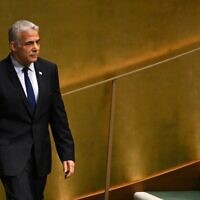Prime Minister Yair Lapid arrives to speak at the 77th session of the United Nations General Assembly at the UN headquarters in New York City on September 22, 2022. (TIMOTHY A. CLARY / AFP)