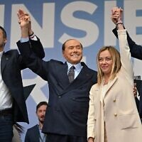 From left to right: Leader of Italian far-right Lega (League) party Matteo Salvini, Forza Italia leader Silvio Berlusconi, leader of Italian far-right party Fratelli d'Italia (Brothers of Italy) Giorgia Meloni, and Italian centre-right lawmaker Maurizio Lupi stand on stage during a joint rally of Italy's coalition of far-right and right-wing parties at Piazza del Popolo in Rome, September 22, 2022. (Alberto Pizzoli/AFP)
