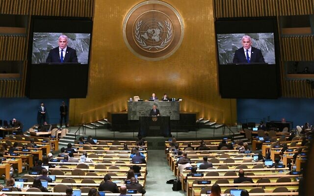 Prime Minister Yair Lapid addresses the 77th session of the United Nations General Assembly at UN headquarters in New York City on September 22, 2022. (Timothy A. Clary/AFP)
