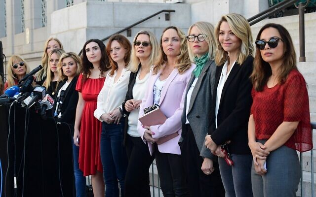 Hollywood actresses and others, part of a group of "silence breakers" who have fought for justice by speaking out about Harvey Weinstein's sexual misconduct, gather during a press conference following Weinstein's guilty verdict in Los Angeles, California, February 25, 2020. (FREDERIC J. BROWN / AFP)