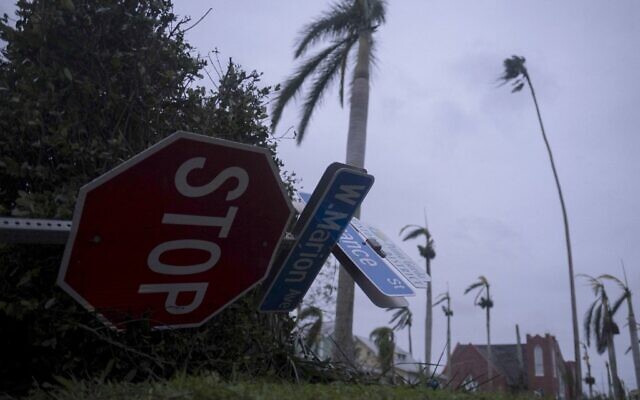 Streets signs are down in the aftermath of Hurricane Ian in Punta Gorda, Florida on September 29, 2022. (Ricardo ARDUENGO / AFP)