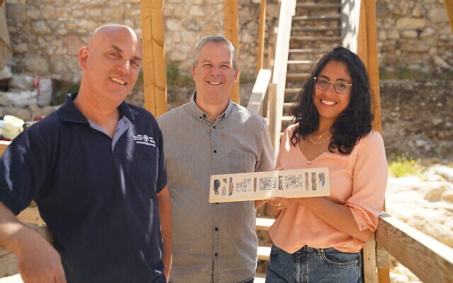 Right to left: Reli Avisar, Prof. Yuval Gadot and Dr. Yiftah Shalev with the rare 8th-7th century BCE find at the City of David. (Gil Mezuman, City of David)