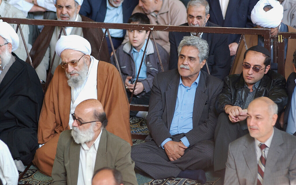 Haroun Yashayaei, the former head of Iran's Jewish community, shown in center, attends a Muslim Friday prayer to show solidarity with the Palestinians. (Hassan Sarbakhsian/ via JTA)