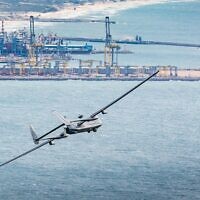 Illustrative: An IAI Heron 1 is seen flying off Israel's coast in early August 2022. (Israel Defense Forces)