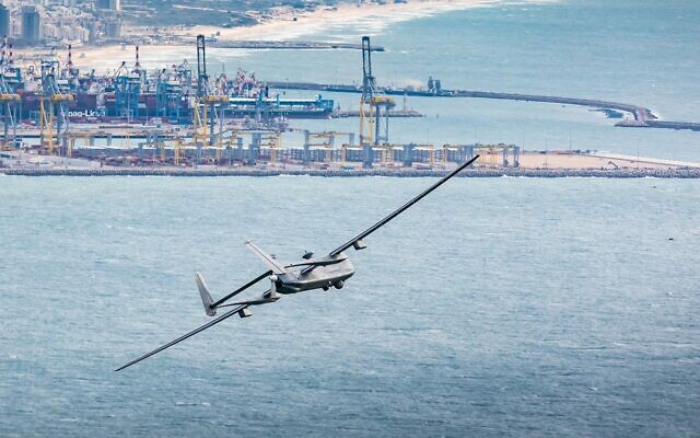 Illustrative: An IAI Heron 1 is seen flying off Israel's coast in early August 2022. (Israel Defense Forces)