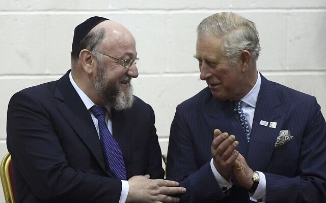 Then-Britain's Prince Charles, right, speaks with chief rabbi Ephraim Mirvis during a visit to Yavneh College, an Orthodox Jewish School, in north London, Wednesday, Feb. 1, 2017. (Toby Melville/Pool Photo via AP)