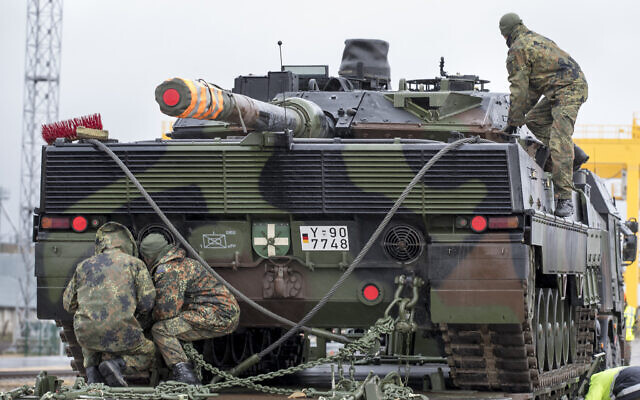 Illustrative: German army soldiers load a Leopard 2 tank onto a truck at the Sestokai railway station some 175 kms (109 miles) west of the capital Vilnius, Lithuania, Friday, February 24, 2017. (AP Photo/Mindaugas Kulbis)
