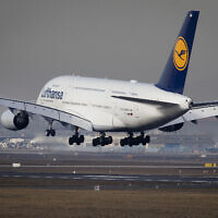 A Lufthansa Airbus A380 lands  in Frankfurt, Germany, Thursday, Feb. 14, 2019. (AP/Michael Probst)