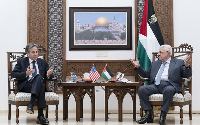 US Secretary of State Antony Blinken, left, listens during a joint statement with Palestinian Authority President Mahmoud Abbas on May 25, 2021, in the West Bank city of Ramallah. (AP Photo/Alex Brandon, Pool)