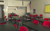 Illustrative: In this image made from video, an empty classroom is shown at David Ellis Academy in Detroit on February. 8, 2021.(AP Photo/Mike Householder File)