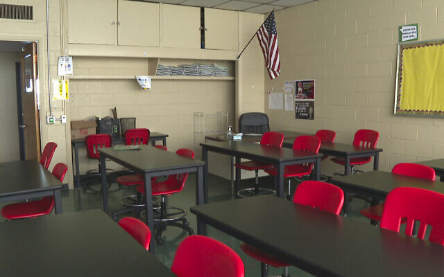 Illustrative: In this image made from video, an empty classroom is shown at David Ellis Academy in Detroit on February. 8, 2021.(AP Photo/Mike Householder File)