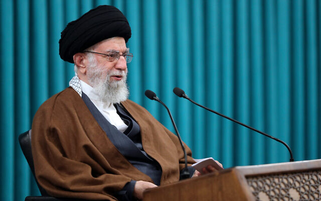 In this photo released by the official website of the office of the Iranian supreme leader, Supreme Leader Ayatollah Ali Khamenei speaks in a televised New Year speech, in Tehran, Iran, on March 21, 2022.  (Office of the Iranian Supreme Leader via AP)