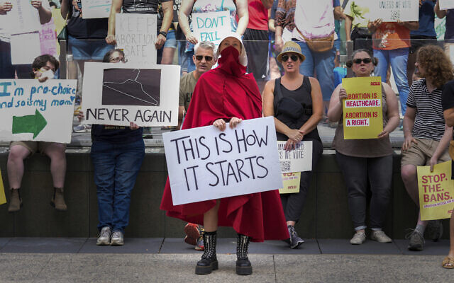 FILE - Abortion-rights activist rally at the Indiana Statehouse following Supreme Court's decision to overturn Roe v. Wade on June 25, 2022 in Indianapolis. (AP Photo/AJ Mast, File)