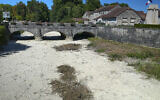 A view the dried-up river Tille in Lux, France, Aug. 9, 2022 (AP Photo/Nicholas Garriga)