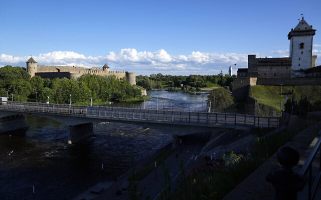 FILE - A bridge straddles Ivangorod, Russia, left, and a border crossing in Narva, Estonia, June 16, 2022. (AP Photo, File)