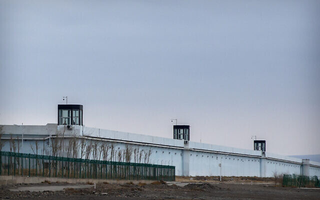 Guard towers stand on the perimeter wall of the Urumqi No. 3 Detention Center in Dabancheng in western China's Xinjiang Uyghur Autonomous Region on April 23, 2021. China's discriminatory detention of Uyghurs and other mostly Muslim ethnic groups in the western region of Xinjiang may constitute crimes against humanity, the UN human rights office said in a long-awaited report released Wednesday, Aug. 31, 2022. (AP/Mark Schiefelbein)