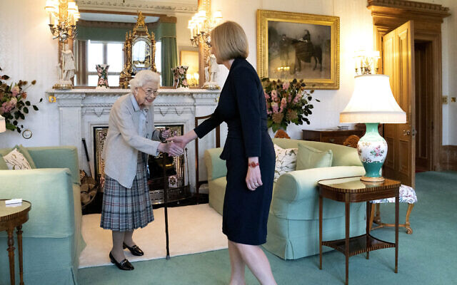 Britain's Queen Elizabeth II, left, welcomes Liz Truss during an audience at Balmoral, Scotland, where she invited the newly elected leader of the Conservative party to become Prime Minister and form a new government, Tuesday, September 6, 2022. (Jane Barlow/Pool Photo via AP)