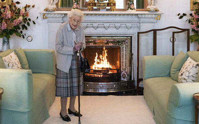 Britain's Queen Elizabeth II waits in the Drawing Room before receiving Liz Truss for an audience at Balmoral, in Scotland, September 6, 2022. (Jane Barlow/Pool Photo via AP, File)