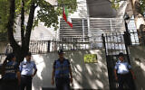 Police guard outside the Iranian Embassy in Tirana, Albania, September 8, 2022. (AP Photo/Franc Zhurda)