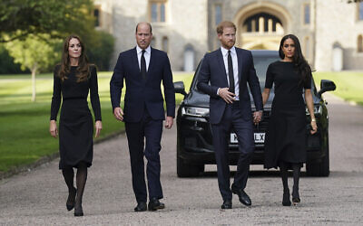 From left, Kate, the Princess of Wales, Prince William, Prince of Wales, Prince Harry and Meghan, Duchess of Sussex walk to meet members of the public at Windsor Castle, following the death of Queen Elizabeth II, in Windsor, England, September 10, 2022. (Kirsty O'Connor/Pool Photo via AP)