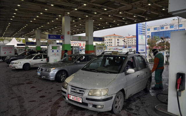 Drivers wait to get fuel at a gas station in the southern Beirut suburb of Dahiyeh, Lebanon, March 15, 2022. (AP Photo/Bilal Hussein, File)