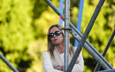 Brothers of Italy leader Giorgia Meloni looks at the crowd of center-right supporters at a rally in central Rome, Thursday, September 22, 2022. (AP Photo/Gregorio Borgia)