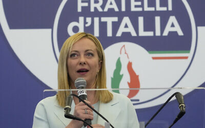 Far-Right party Brothers of Italy's leader Giorgia Meloni speaks to the media at her party's electoral headquarters in Rome, early September 26, 2022. (AP Photo/Gregorio Borgia)