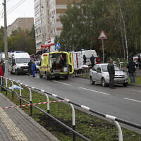 Police and paramedics work at the scene of a shooting at school No. 88 in Izhevsk, Russia, September 26, 2022. (AP Photo)