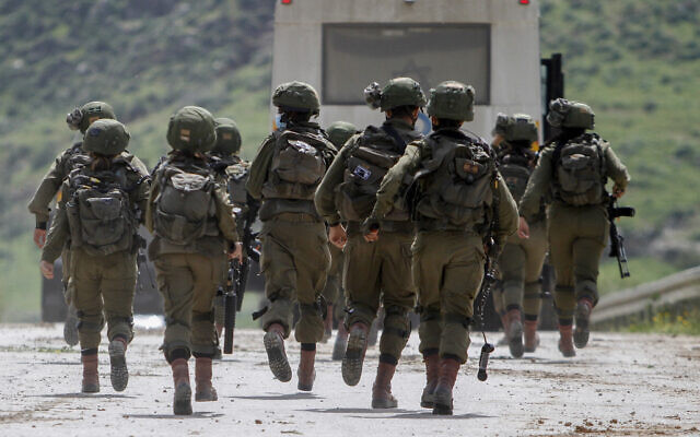 Illustrative -- Israeli security forces in the West Bank on March 10, 2021 (Nasser Ishtayeh/Flash90)
