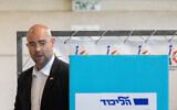 Likud MK Amir Ohana votes at a Likud polling station during his parties primaries in Jerusalem on August 10, 2022. (Yonatan Sindel/Flash90)