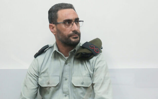 Dan Sharoni, an IDF officer accused of sexual offenses, during a court hearing at a military court in Beit Lid, July 24, 2022. (Gideon Markowicz/Flash90)