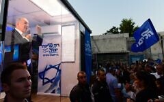 Likud party head Benjamin Netanyahu at a Tel Aviv election event in his "Bibi Ba" campaign bus, September 7, 2022 (Tomer Neuberg/Flash90)