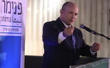 Then prime minister Naftali Bennett gives a speech at an event in Lod on September 14, 2022 in Lod. (Flash90)