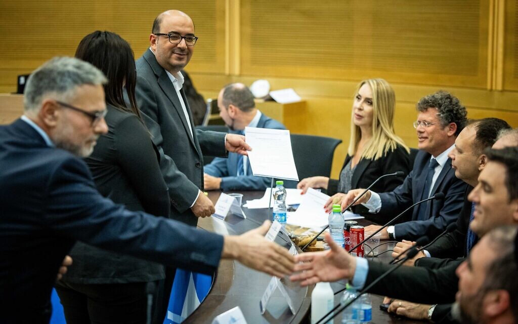 Members of Balad register their party for the upcoming elections, at the Knesset in Jerusalem, on September 15, 2022. Third from left is party leader Sami Abou Shahadeh. (Yonatan Sindel/Flash90)