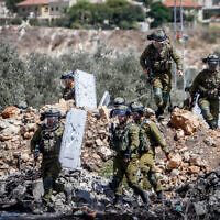 Illustrative: Israel troops operate near Kfar Qaddum in the West Bank city on September 23, 2022. (Nasser Ishtayeh/Flash90)