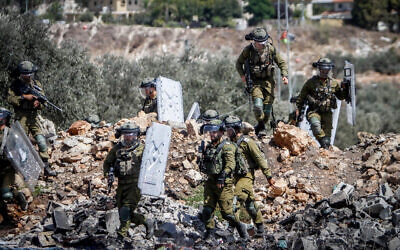 Illustrative: Israel troops operate near Kfar Qaddum in the West Bank city on September 23, 2022. (Nasser Ishtayeh/Flash90)