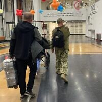 Two Ukrainian soldiers who were injured in the war in Ukraine arrive at Sheba medical center, September 26, 2022 (Sheba medical center via Twitter; used in accordance with clause 27a of the Copyright Law)