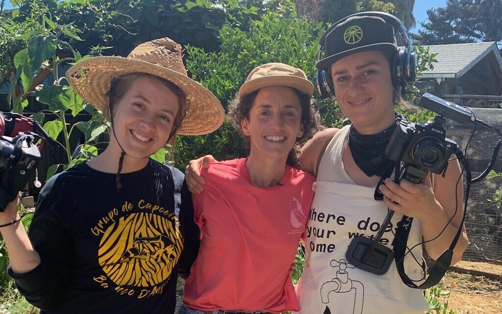 Nina Gordon-Kirsch and poses with her film crew, Marielle Olentine and Julia Maryanska, on the first day of her trip on June 28, 2022. (Courtesy/ Brian Nguyen)