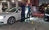 Officers at the scene of a suspected double murder in Lod, on September 5, 2022, where a mother in her 30s and her 14-year-old daughter, a twin, were killed. The surviving twin was seriously injured. (Police)