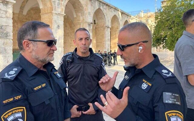 In this handout photo, Israel Police Commissioner Yaakov "Kobi" Shabtai (L) speaks with Jerusalem District Police Commander Doron Turgeman (R) on the Temple Mount in Jerusalem's Old City, September 27, 2022. (Israel Police)