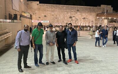 A Pakistani peace delegation visit the Western wall in Jerusalem's Old City, September 21, 2022. (Ash Obel/The Times of Israel)
