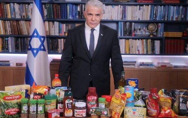 Prime Minister Yair Lapid unveils an initiative to lower the cost of food on September 28, 2022. (Courtesy)