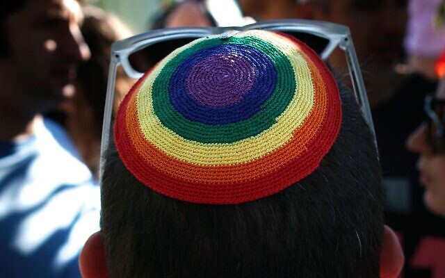 An Israeli man wears a rainbow kippa during the annual Gay Pride march in Jerusalem on July 21, 2016. (Thomas COex/AFP/Getty Images via JTA)